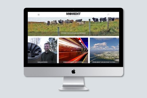 En forside av Sweco Moment vist på en imac. Lys grå bakgrunn.